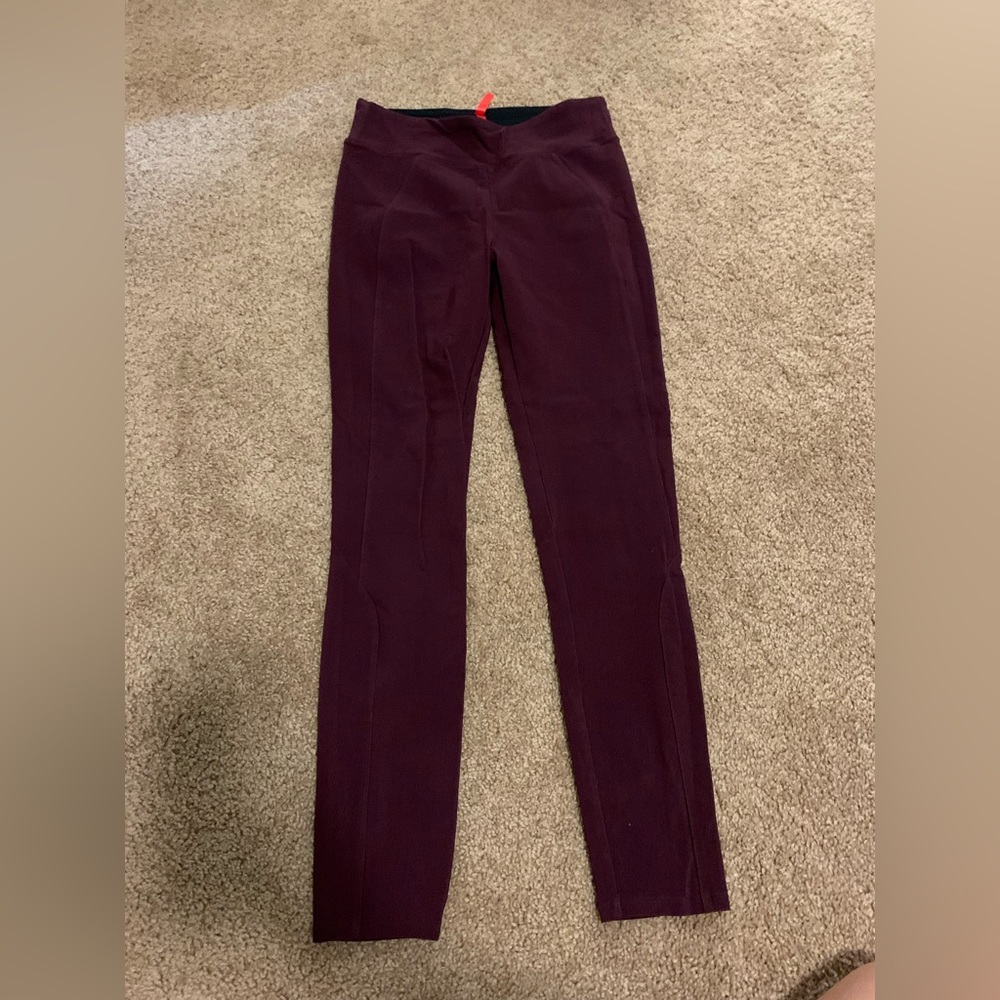 Spanx, maroon colored leggings.